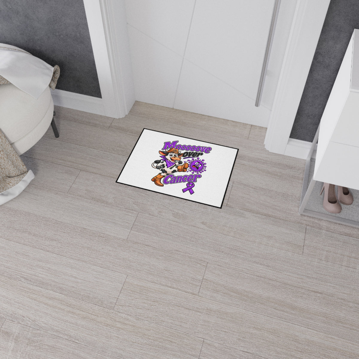 Moooove Over Cancer floor mat in a bedroom entryway with awareness artwork