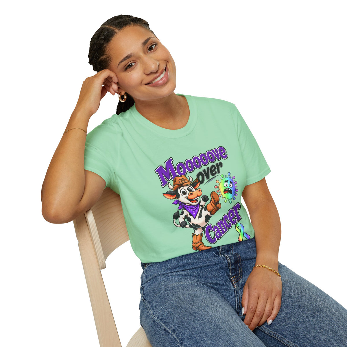 Woman wearing the mint green Moooove Over Cancer T-shirt