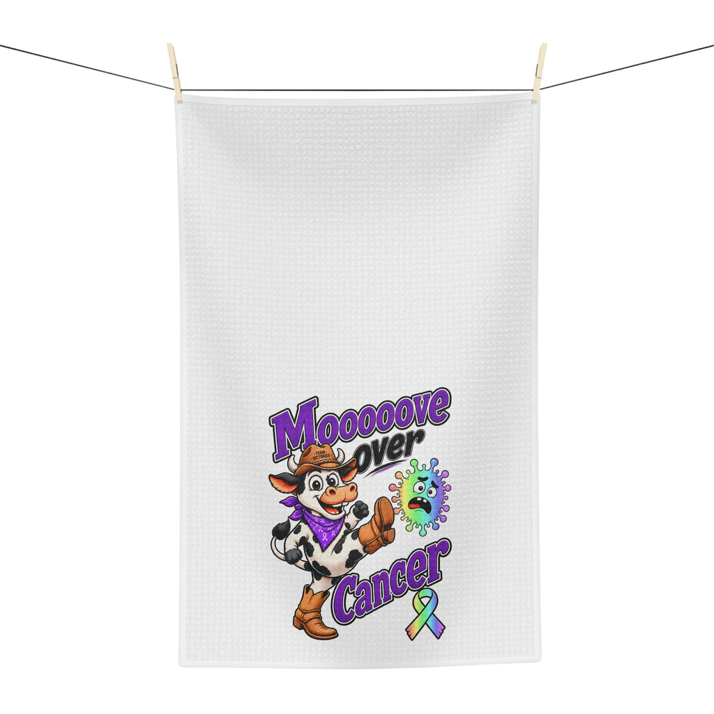 Moooove Over Cancer tea towel hanging outdoors with colorful cow and ribbon design