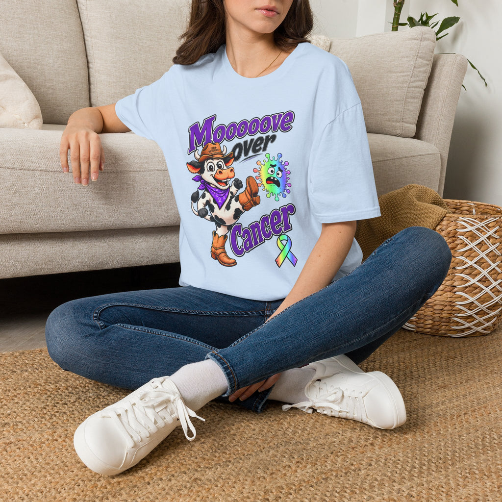Woman wearing the light blue Moooove Over Cancer T-shirt