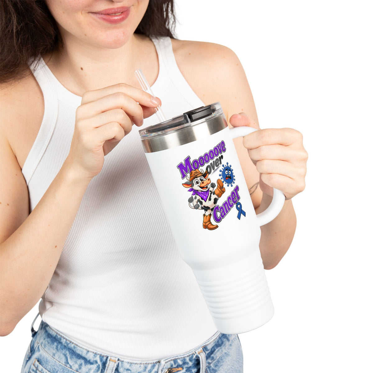 Person holding Moooove Over Cancer 40 oz travel mug with Colon Cancer awareness artwork