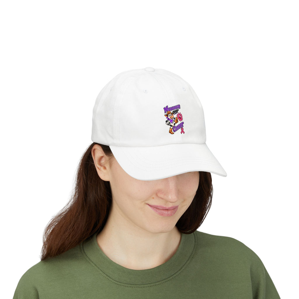 Woman wearing a white Moooove Over Cancer dad cap with Breast Cancer awareness artwork