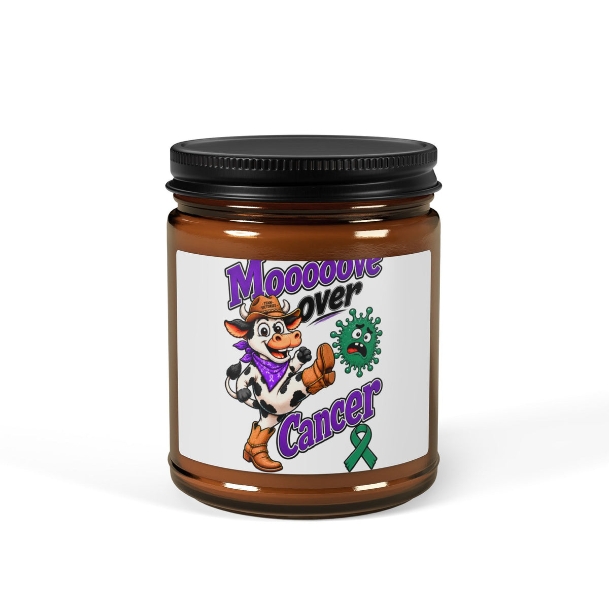 Close-up of Moooove Over Cancer amber jar candle with Liver Cancer awareness ribbon design