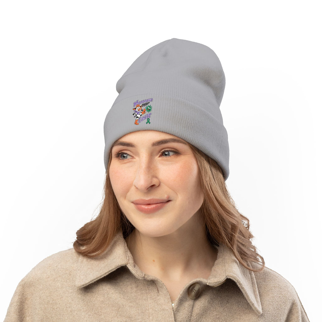 Model wearing gray Moooove Over Cancer embroidered beanie with awareness artwork