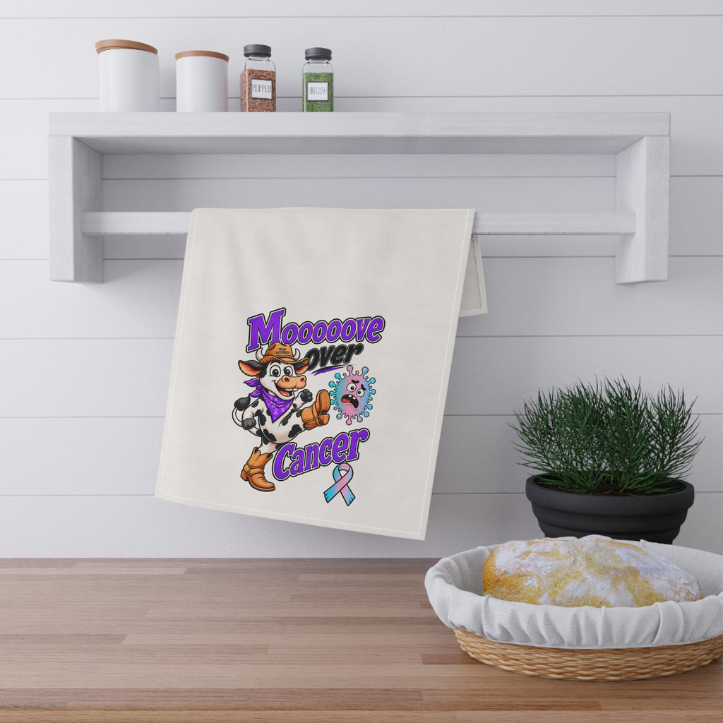Moooove Over Cancer tea towel displayed in a kitchen beside baked goods