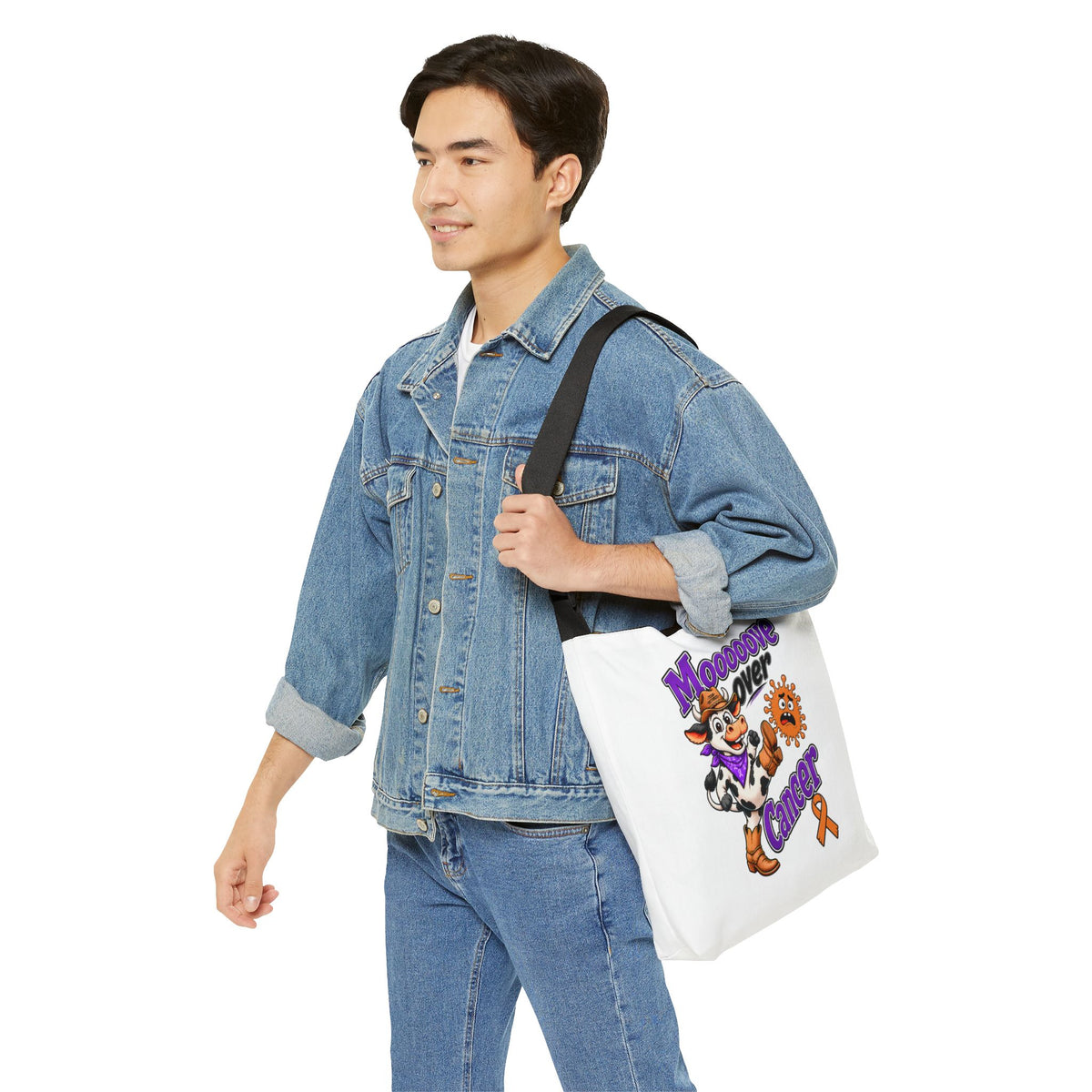 Person wearing the Moooove Over Cancer tote over the shoulder