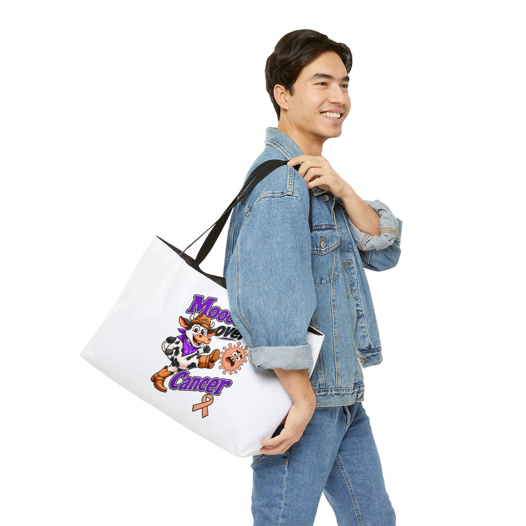 Man carrying the Moooove Over Cancer cow design weekender tote bag