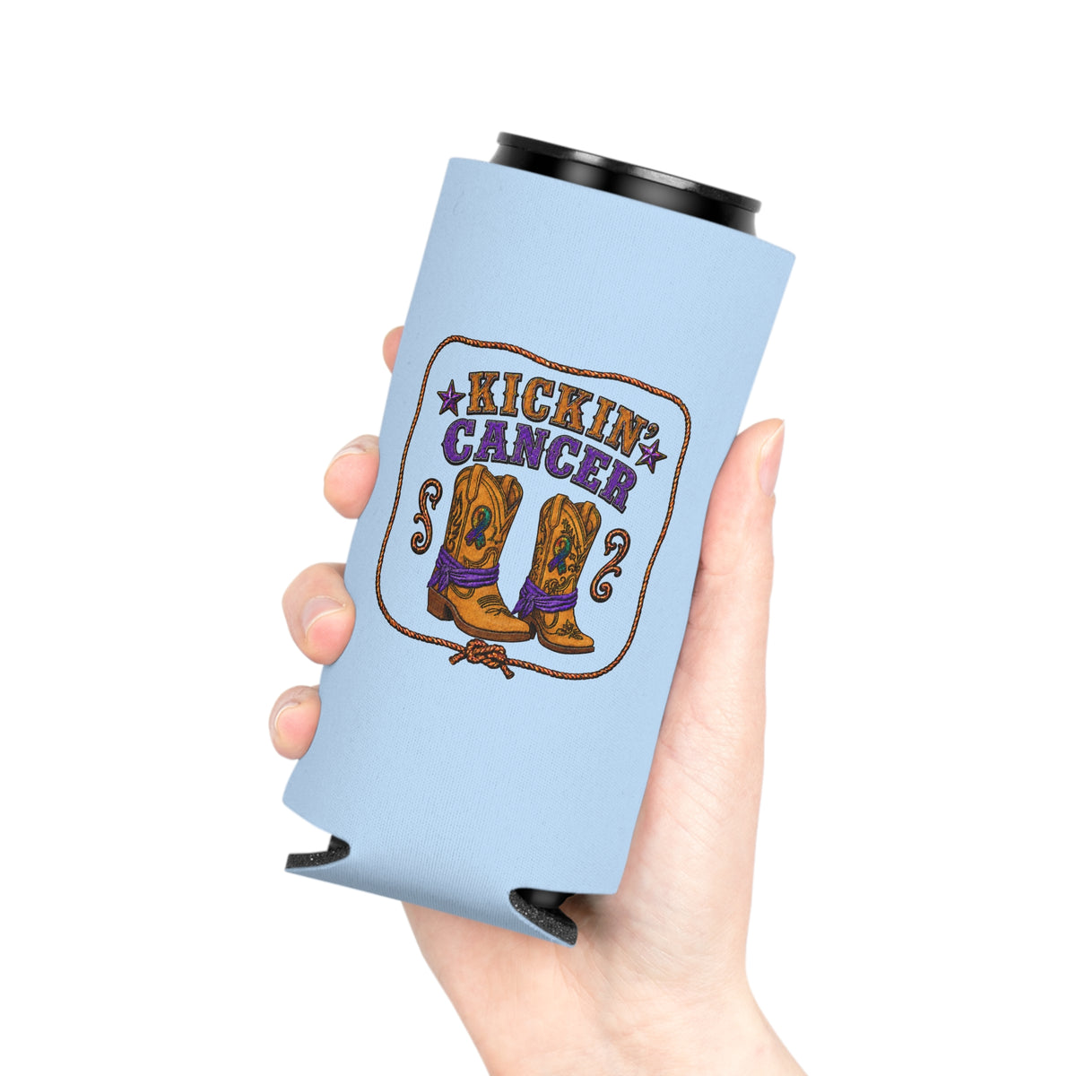 Hand holding an angled light blue Kickin' Cancer slim can cooler with boot artwork