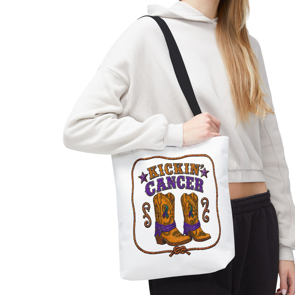 Person wearing a Kickin' Cancer cowboy boot tote bag with black handles