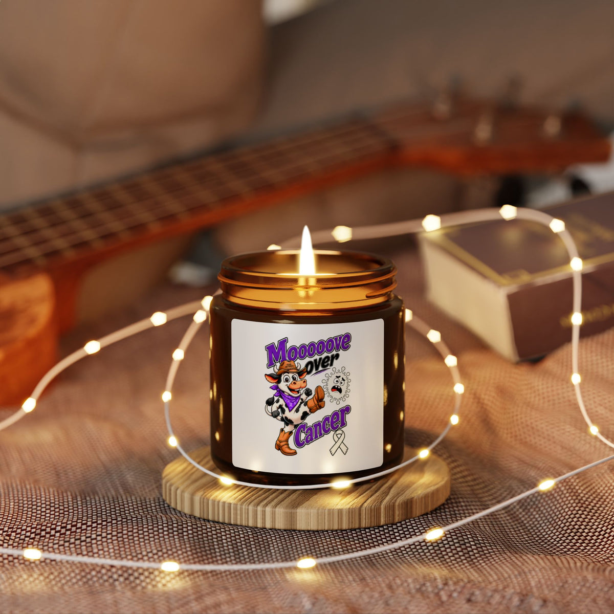 Lit Moooove Over Cancer Lung Cancer awareness ribbon candle in a cozy setting