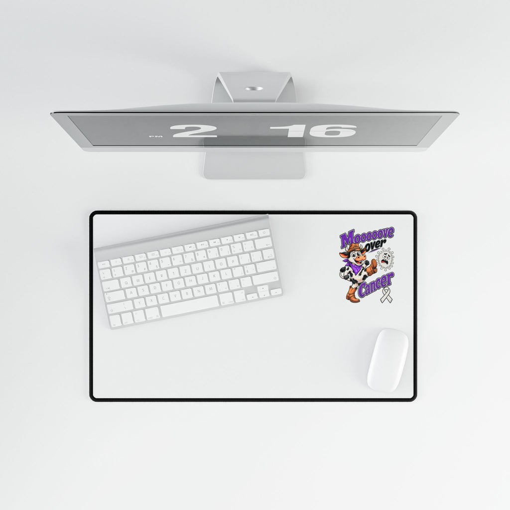 Moooove Over Cancer desk mat with cowgirl cancer artwork in a clean workstation