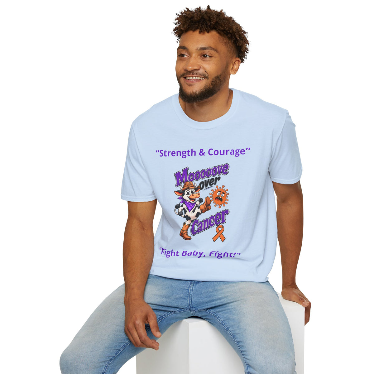 Folded pink Moooove Over Cancer T-shirt with Western character design