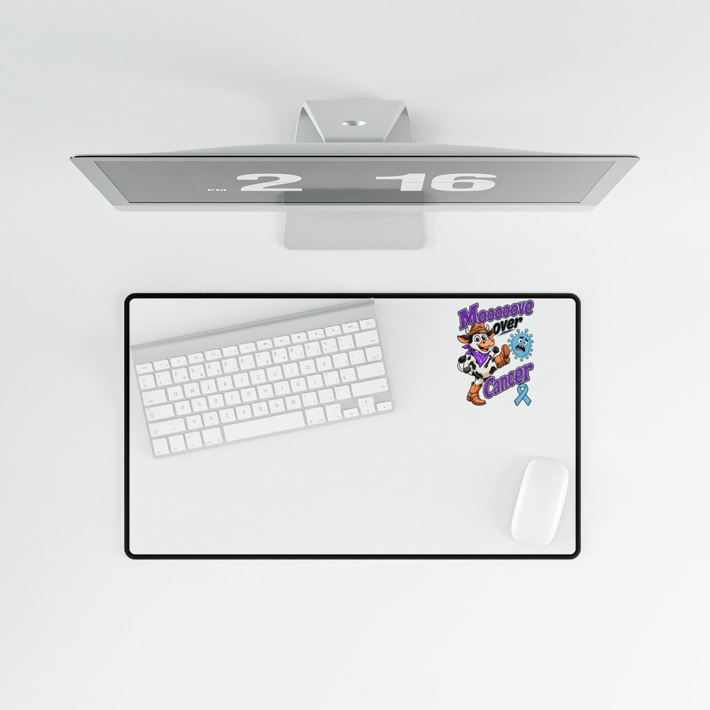 Moooove Over Cancer mouse pad beneath a keyboard and mouse