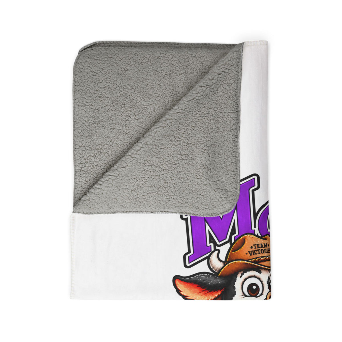 Moooove Over Cancer blanket showing plush gray sherpa reverse and printed cow design